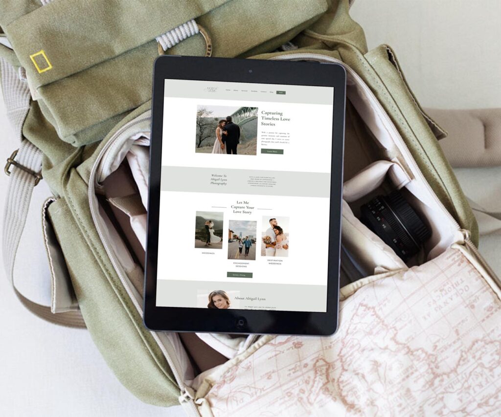 ipad with showit template on screen sitting on top of an open camera bag