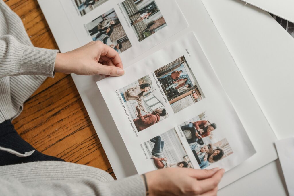 person looking at photos.